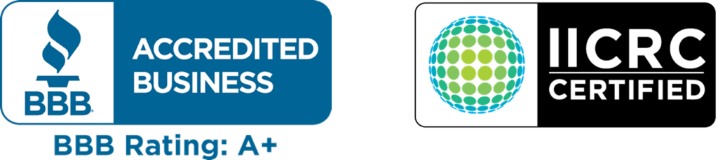 Two certification badges: one for BBB Accredited Business with A+ rating in blue, and one for IICRC Certified with a green and blue globe, highlighting Divine Restoration Group’s commitment to quality property restoration in Charlotte.